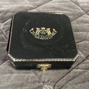 Costume Jewlery vintage juicy couture earrings never worn. Had in storage